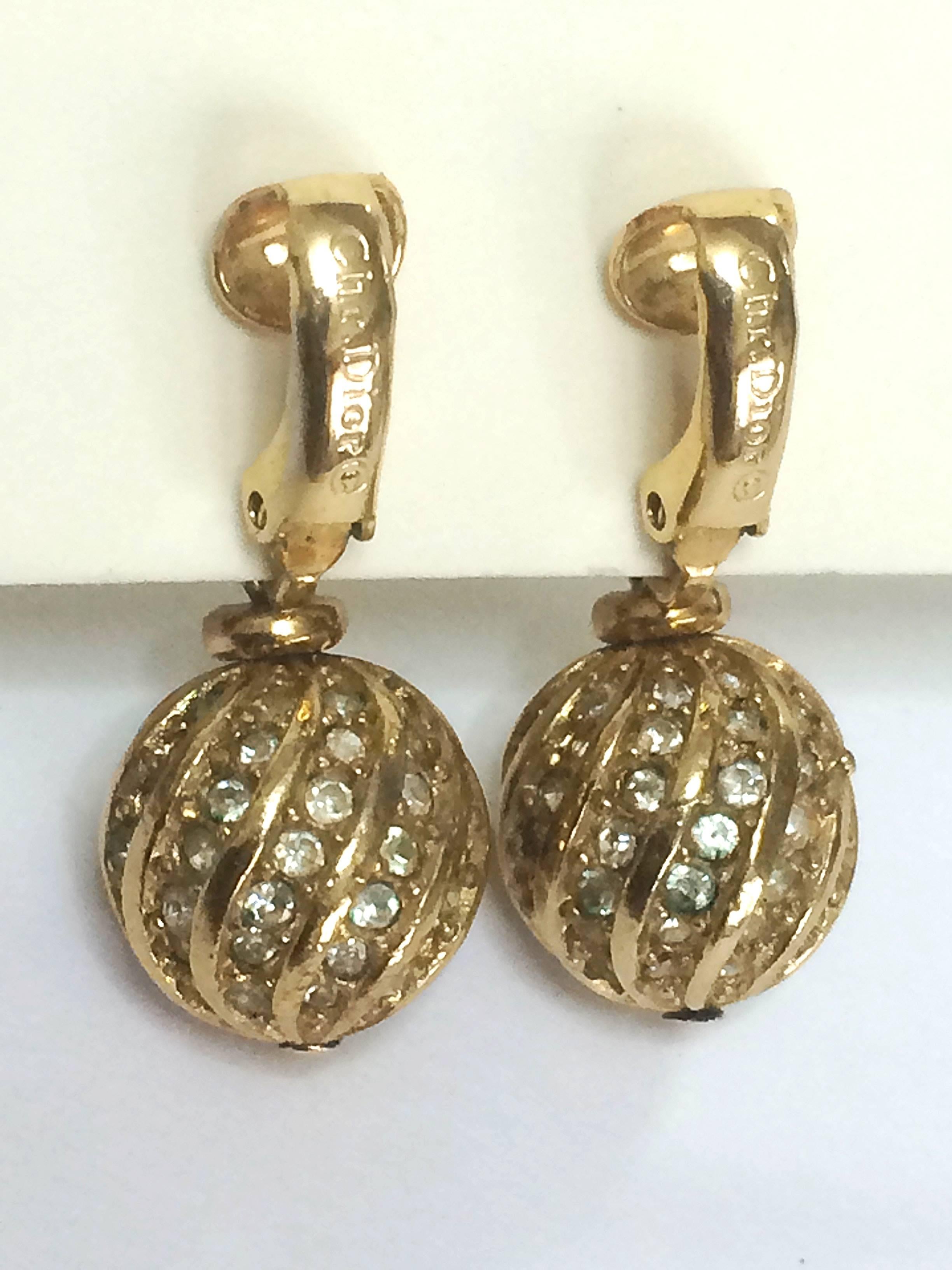 Women's Vintage Christian Dior golden ball charm dangling earrings, rhinestone crystals For Sale
