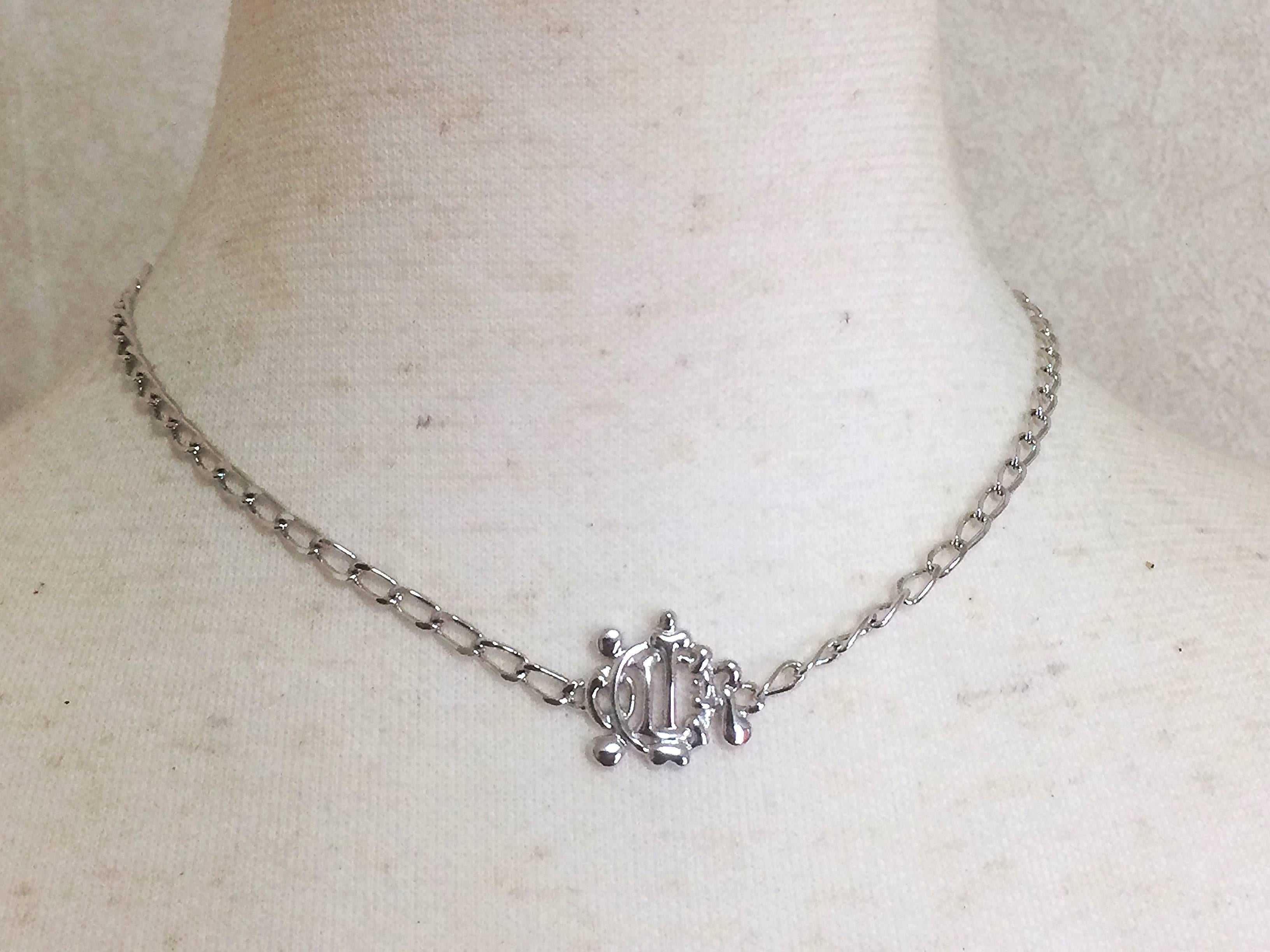 MINT. Vintage Christian Dior silver tone chain necklace with logo motif top. For Sale 2