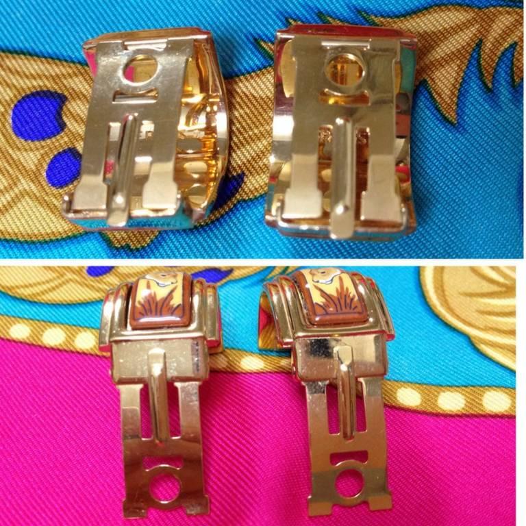  MINT. Vintage Hermes cloisonne porcelain golden earrings with twin lions design 1
