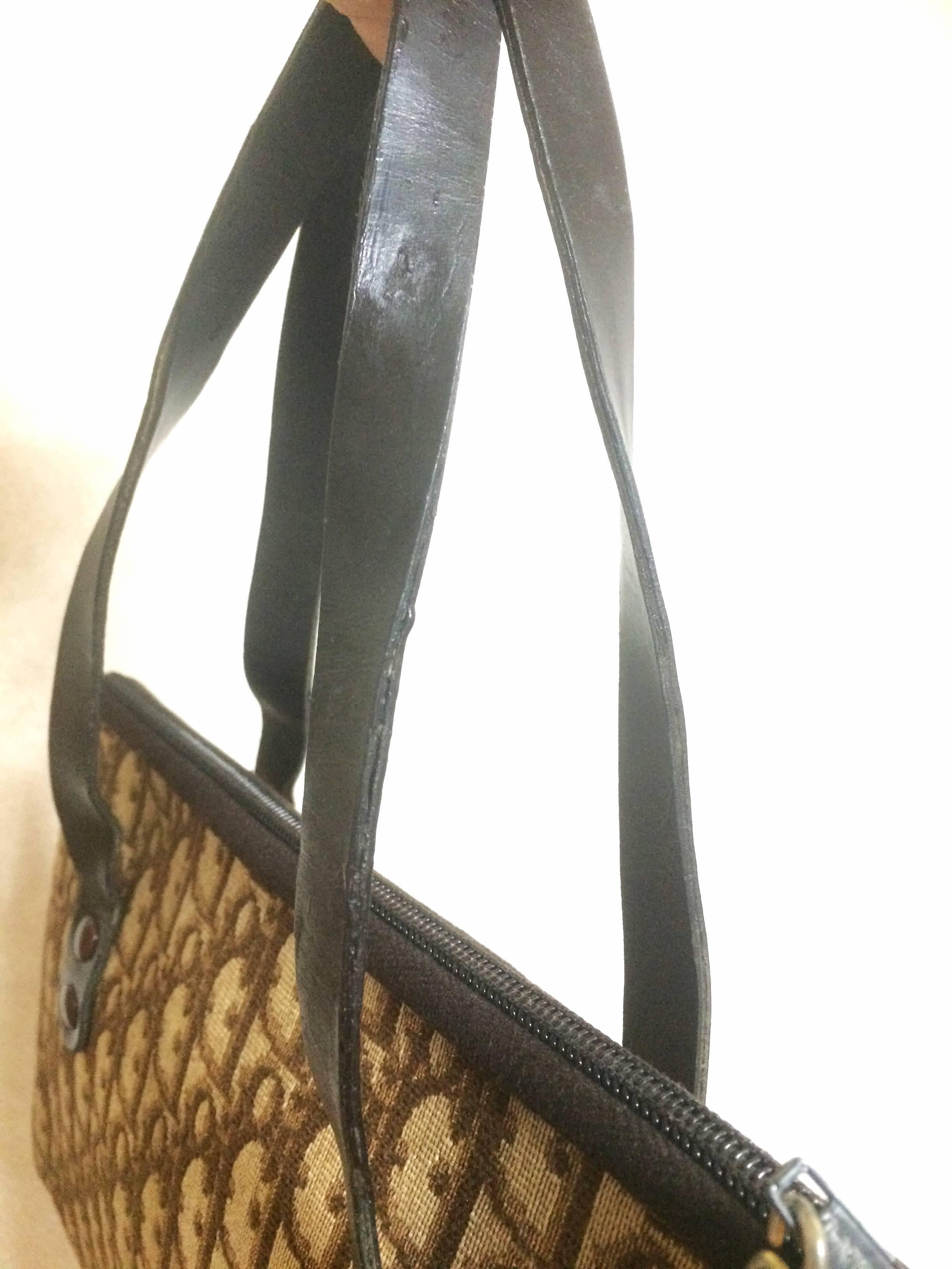 Women's Vintage Christian Dior brown trotter jacquard mini handbag with leather handles.