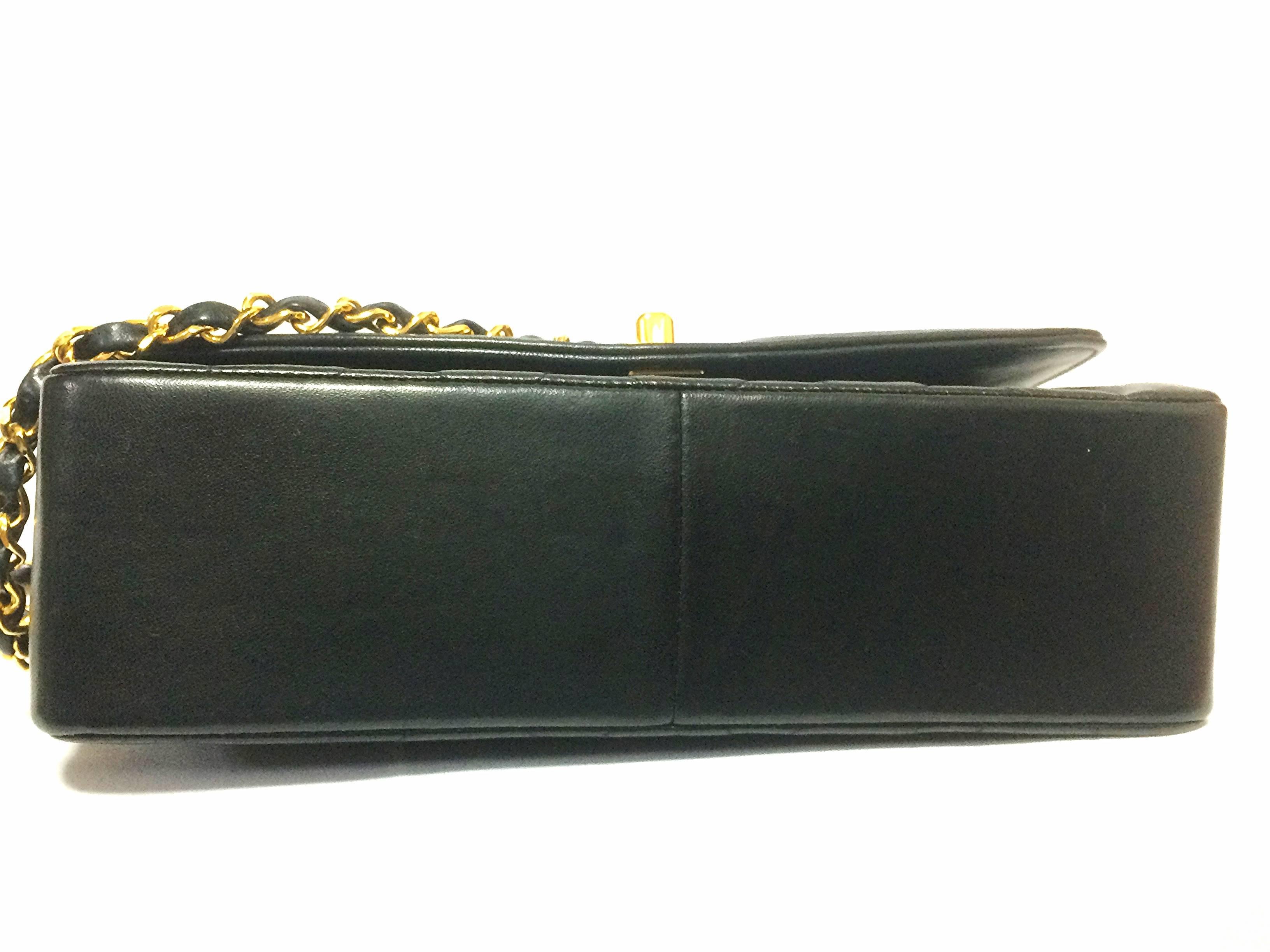 MINT. Vintage CHANEL black lambskin classic flap 2.55 gold chain shoulder bag. 1