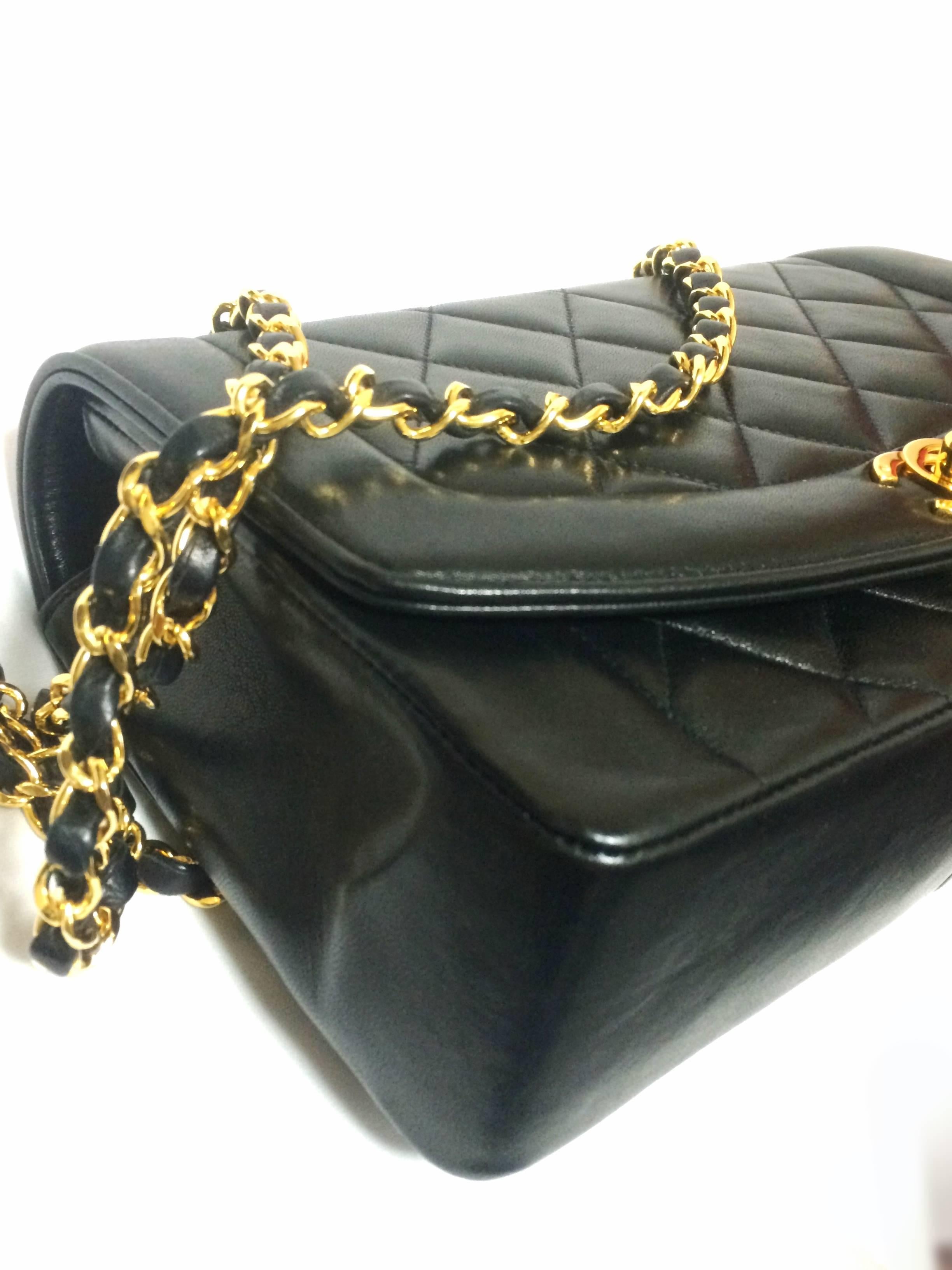 Women's MINT. Vintage CHANEL black lambskin classic flap 2.55 gold chain shoulder bag.