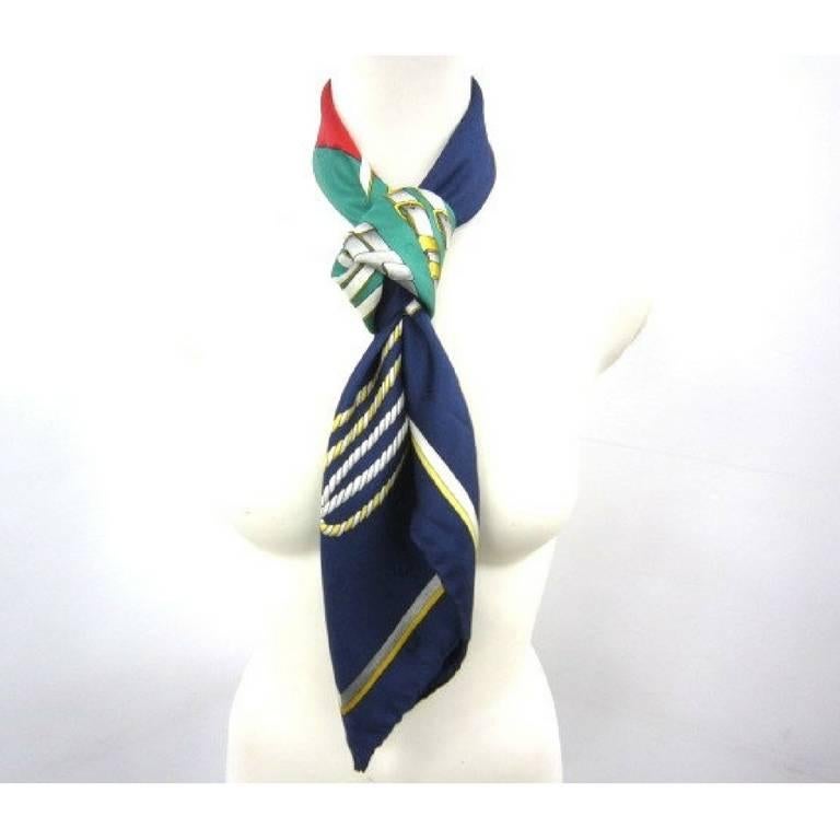 1980s. Vintage Gucci classic green red and navy with GG motif print silk scarf. Iconic webbing collection. Great gift.

This is a 100% silk scarf, large size from GUCCI in the 80s webbing collection with red, green, and navy color combination.