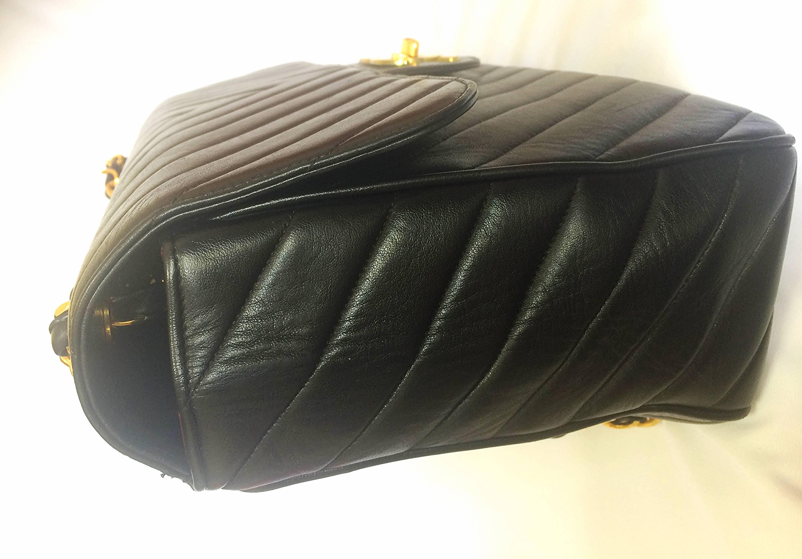 Black Vintage CHANEL classic jumbo, large 2.55 black shoulder bag with chevron stitch
