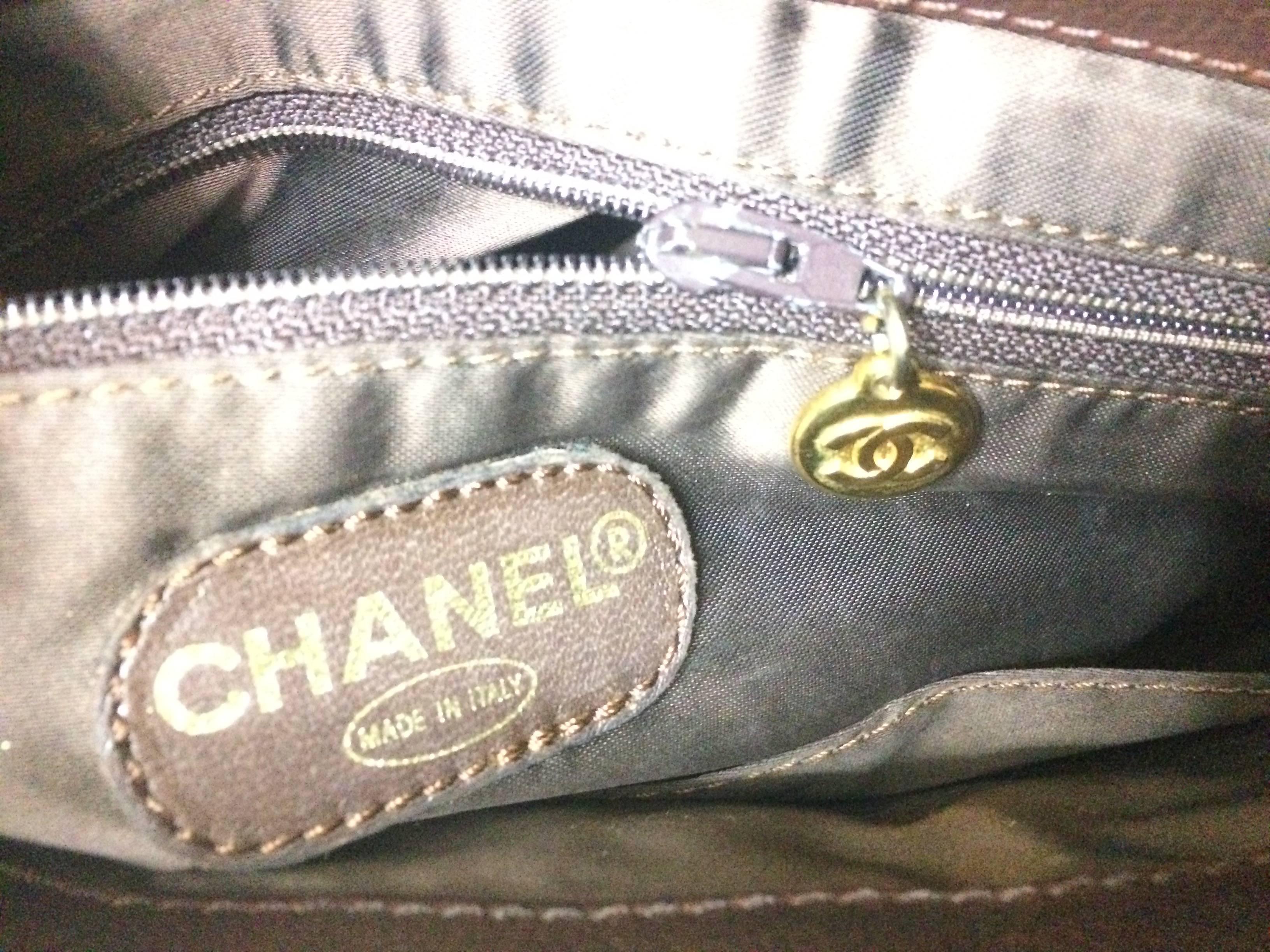Vintage CHANEL dark brown caviar leather chain shoulder tote bag with golden CC. For Sale 1