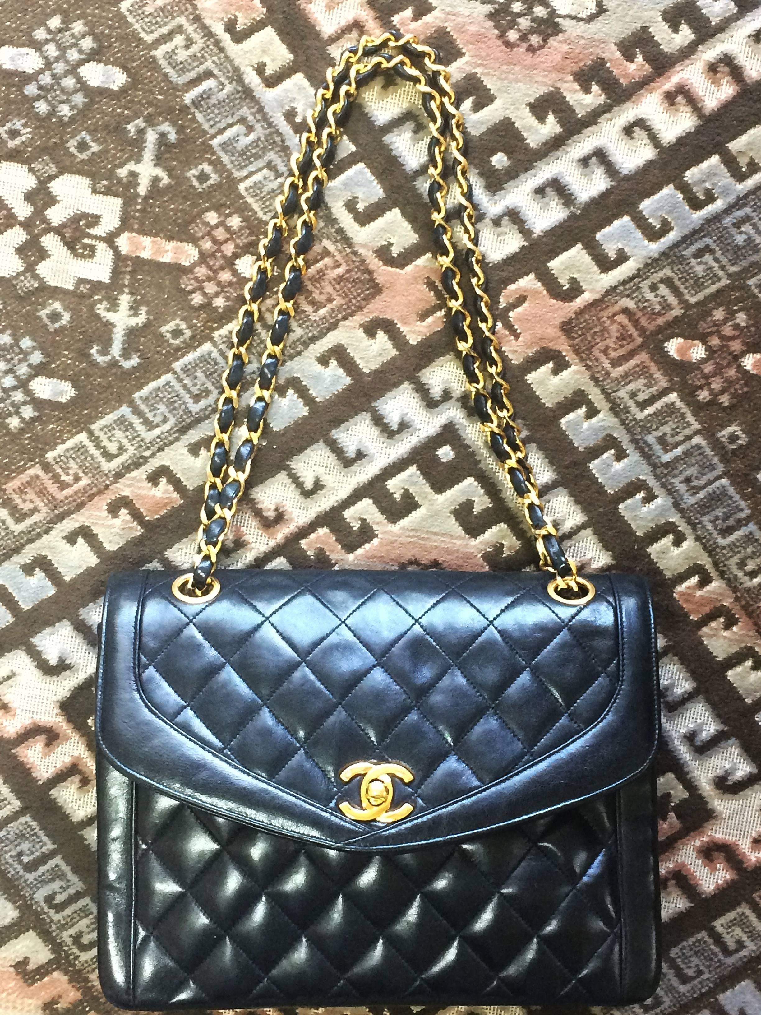 1990s. Vintage Chanel black lambskin chain shoulder 2.55 shoulder bag, pentagon flap.

If you are a vintage CHANEL lover/collector, then this is a must-have piece for your collection!
Introducing a very rare vintage CHANEL black chain shoulder purse