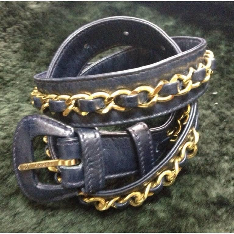 1980s. Vintage CHANEL navy leather belt with gold tone chains. Must-have belt from CHANEL. size 69 ~ 75 , 27", 28", 29", 29.5”.


Here is another fabulous piece from CHANEL back in the 80's.
Introducing a navy leather and chain belt