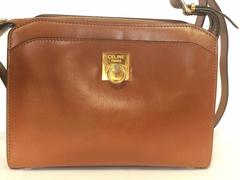 Vintage CELINE genuine brown leather shoulder bag with golden logo motif.