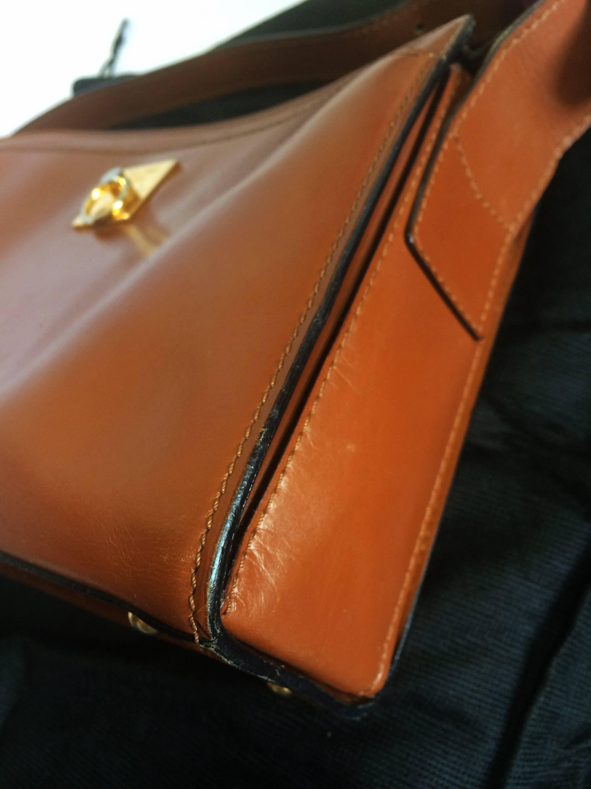 Vintage CELINE genuine brown leather shoulder bag with golden logo motif. 1