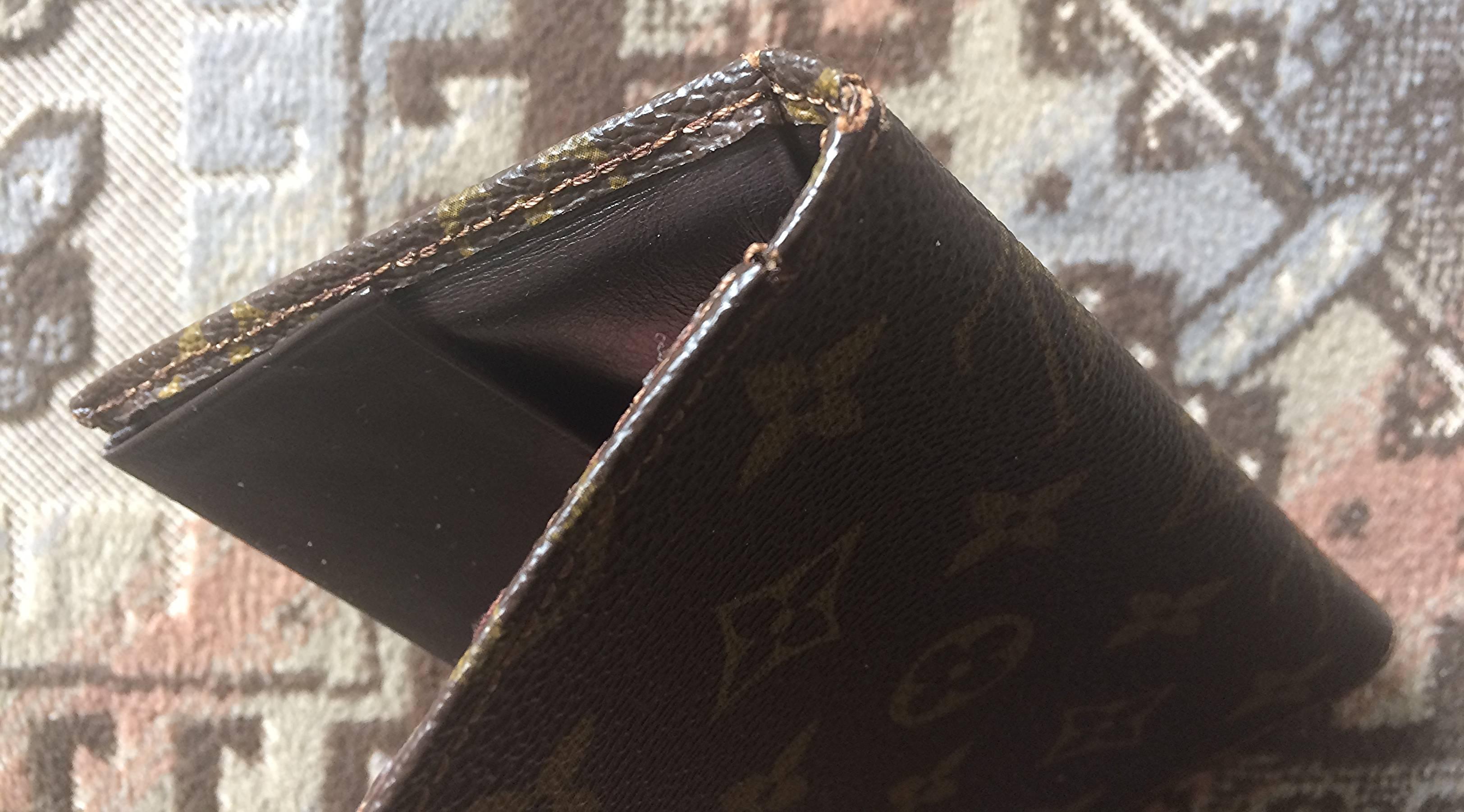 Black 80's vintage Louis Vuitton brown monogram and leather wallet. Classic and unisex