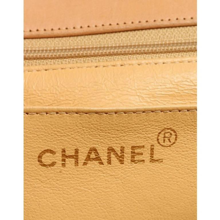 Vintage CHANEL tan brown allover logo embossed leather jumbo, large
