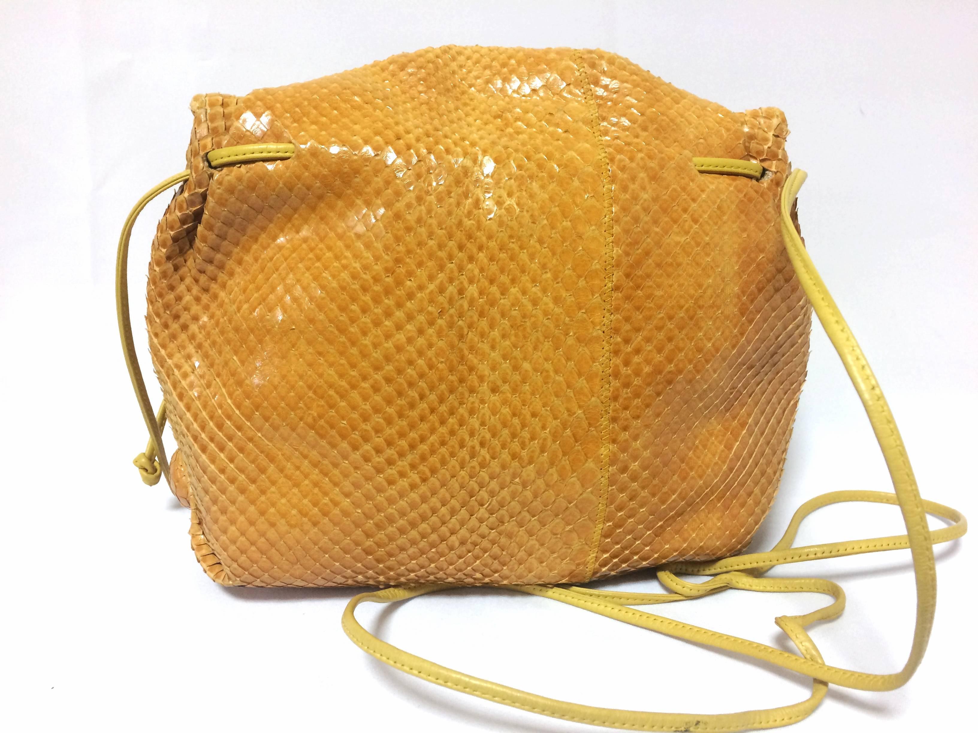 Yellow Vintage Carlos Falchi genuine yellow snakeskin shoulder bag in unique round form
