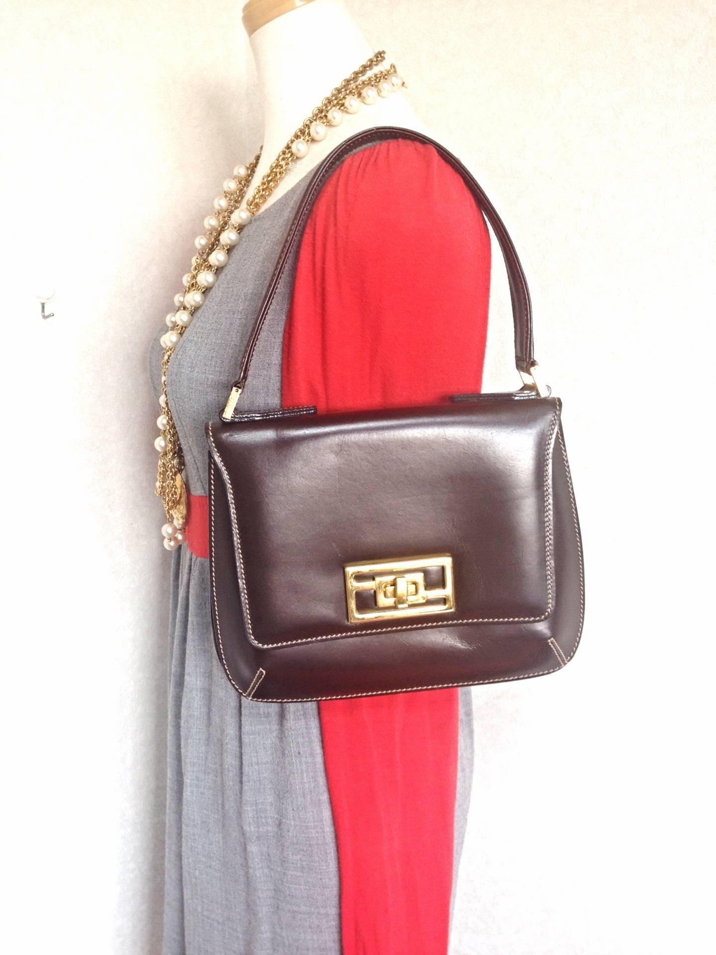 Vintage FENDI genuine dark brown leather handbag with golden FF logo at closure. For Sale 5