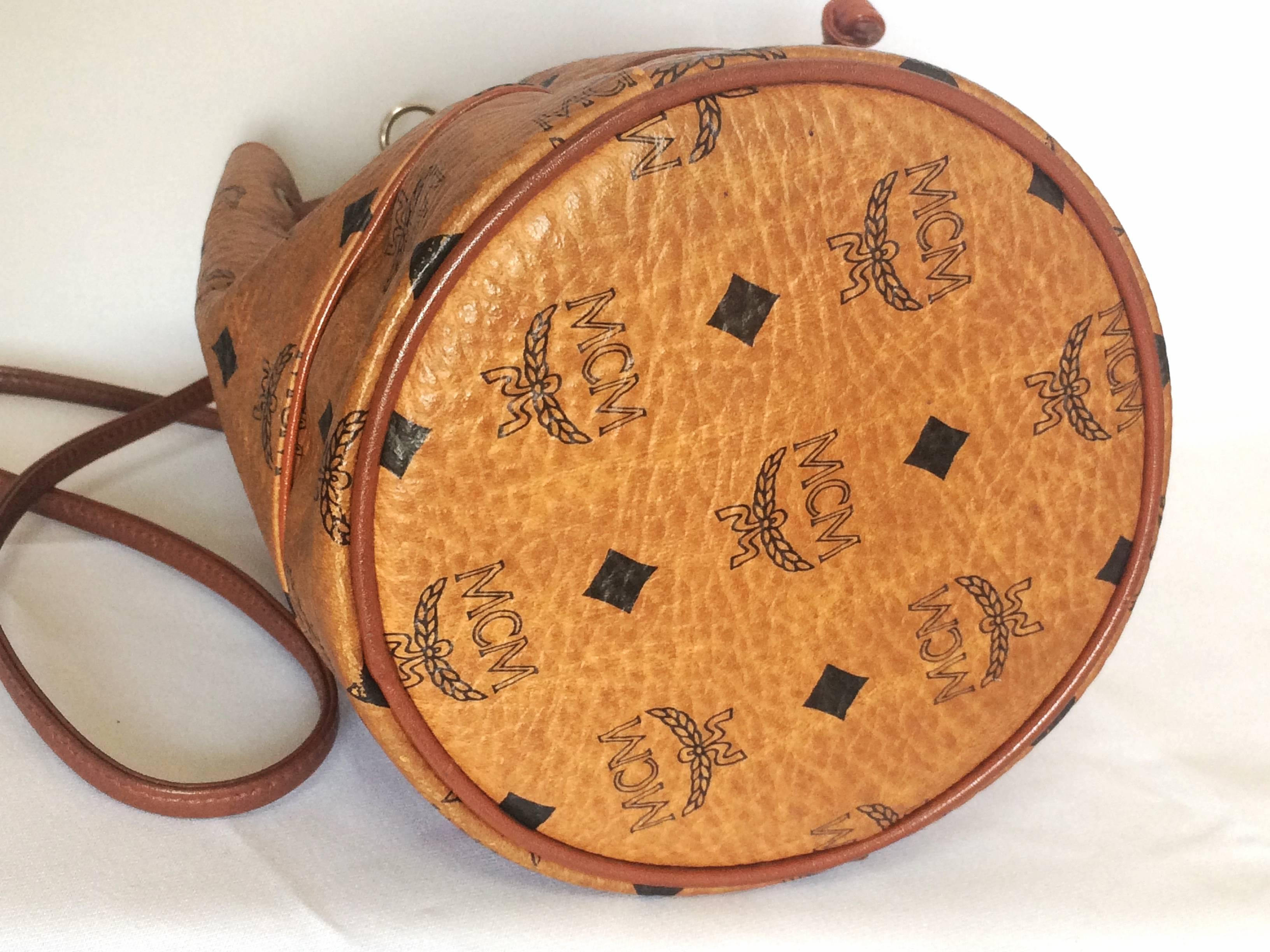 Brown Vintage MCM brown monogram small hobo bucket bag. mini purse. So chic and cute. 