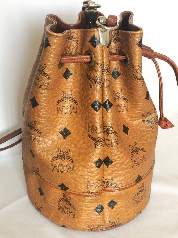 Vintage MCM brown monogram small hobo bucket bag. mini purse. West Germany  made at 1stDibs