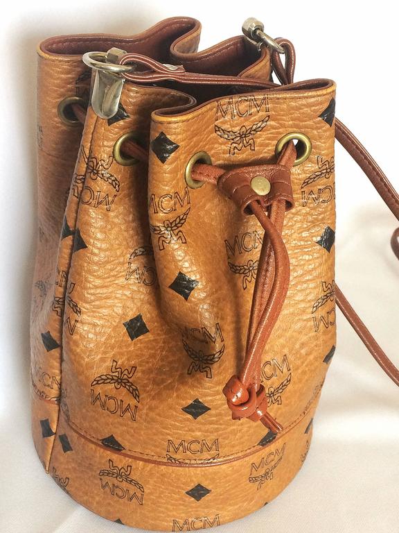 Vintage MCM brown monogram small hobo bucket bag. mini purse. So chic and  cute. at 1stDibs