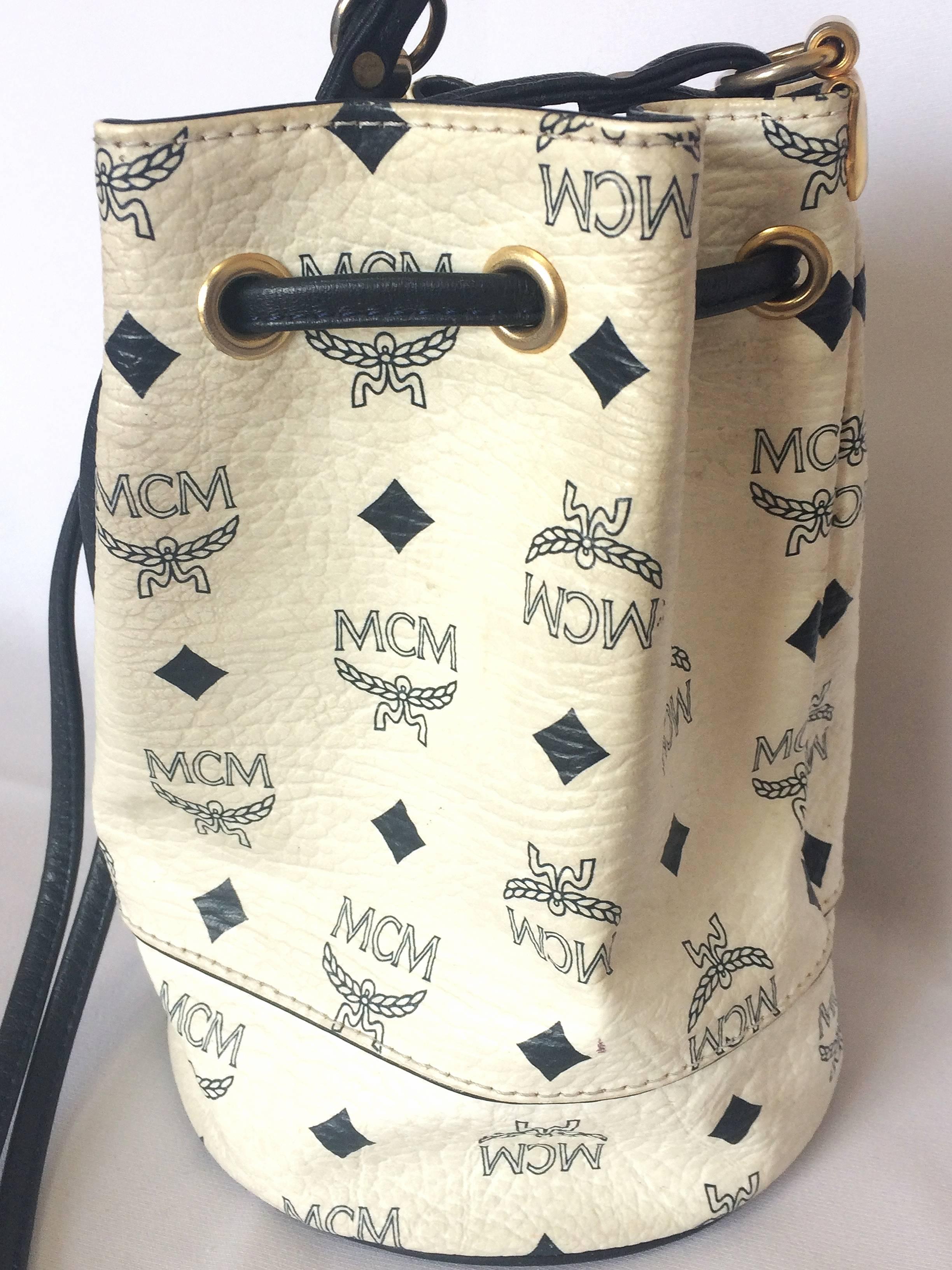 White Vintage MCM white and navy monogram small hobo bucket bag. So chic and cute.