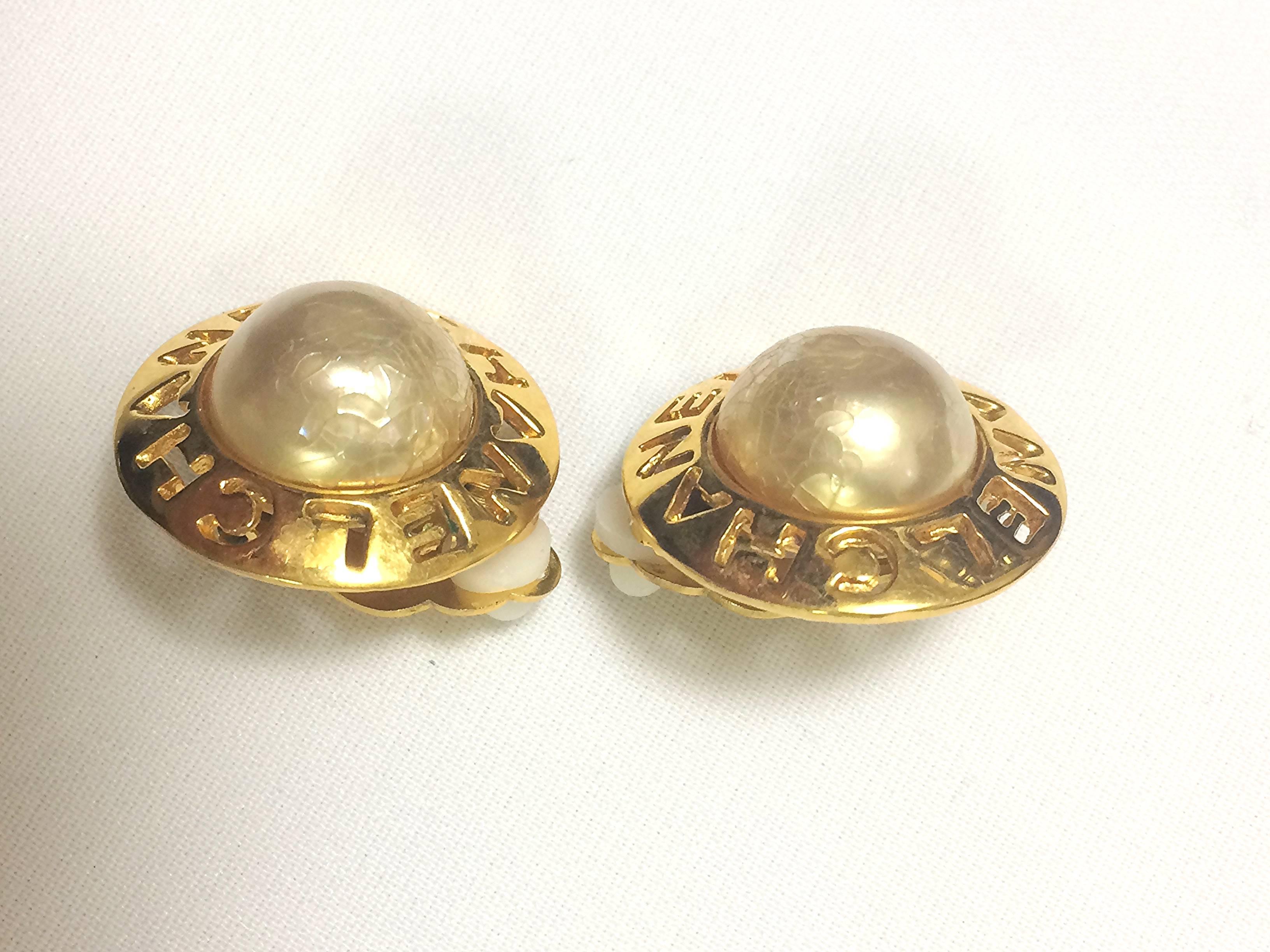 Vintage CHANEL golden round shape faux pearl earrings with cutout logo. Chic. 1