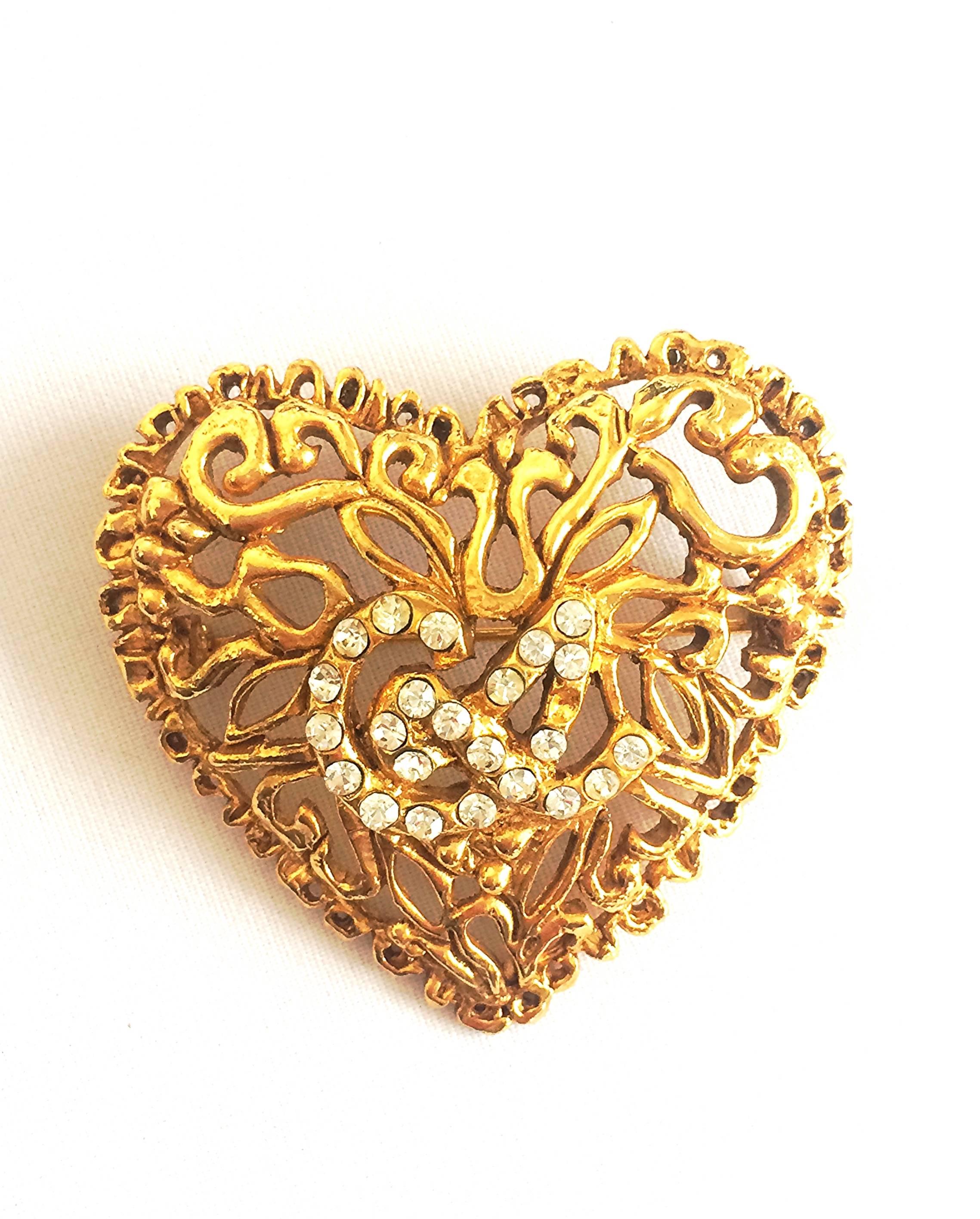 1990s. Vintage Christian Lacroix golden edwardian heart and arabesque design brooch, hat pin, jacket pin with crystal stones. Perfect jewelry.

Vintage Christian Lacroix golden edwardian heart and arabesque design brooch, hat pin, jacket pin with