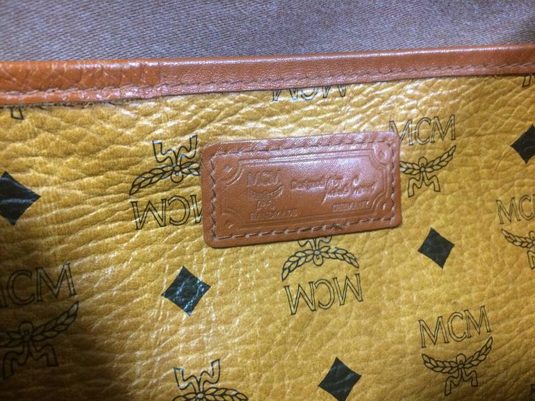 Reserved for Terry. Vintage MCM brown monogram saumur messenger