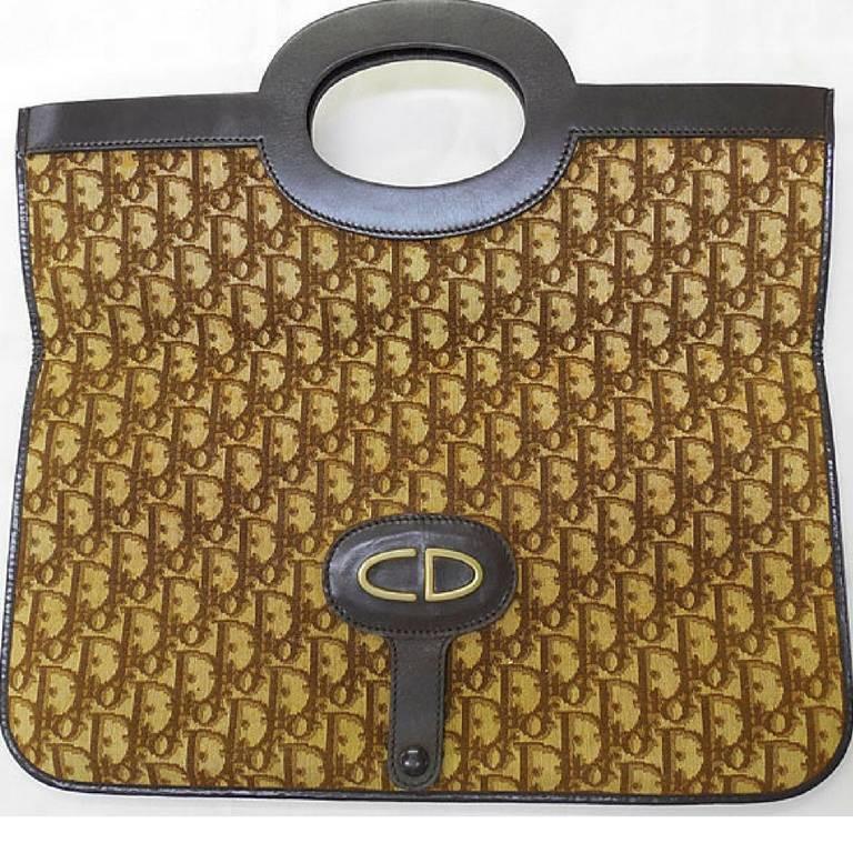 Vintage Christian Dior brown trotter clutch bag. Seen on the SATC
