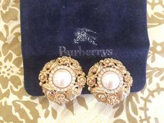 Vintage Burberrys golden Edwardian flower and arabesque design earrings.