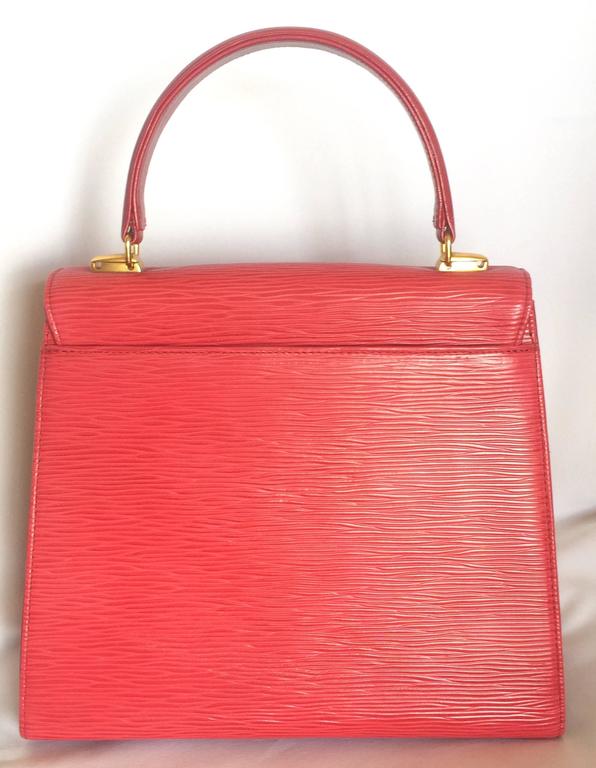 Vintage Valentino Garavani pink red epi leather handbag with round V logo  motif. at 1stDibs