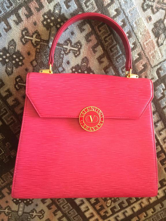 Vintage Valentino Garavani pink red epi leather handbag with round 