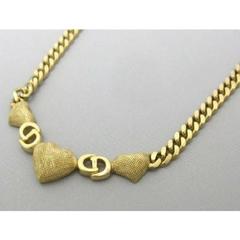 Vintage Christian Dior logo and heart motif, golden chain statement necklace.