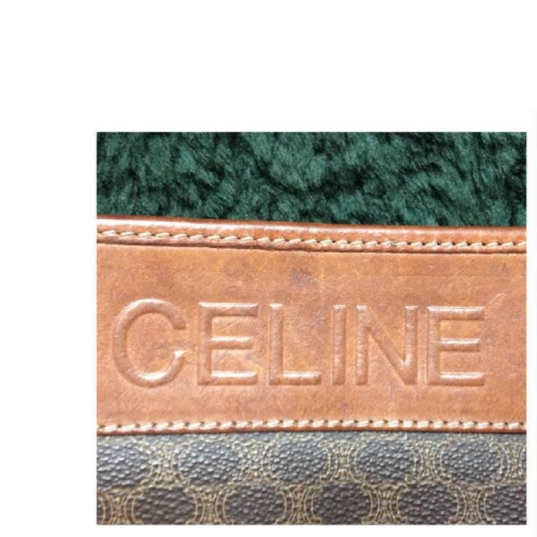 1990s. Vintage CELINE brown macadam blason pattern cosmetic, toiletry purse with leather trimmings. Can be used as a clutch bag. Unisex use.

This is a vintage brown toilet purse, cosmetic pouch purse from CELINE. Can be used as unisex.
The iconic