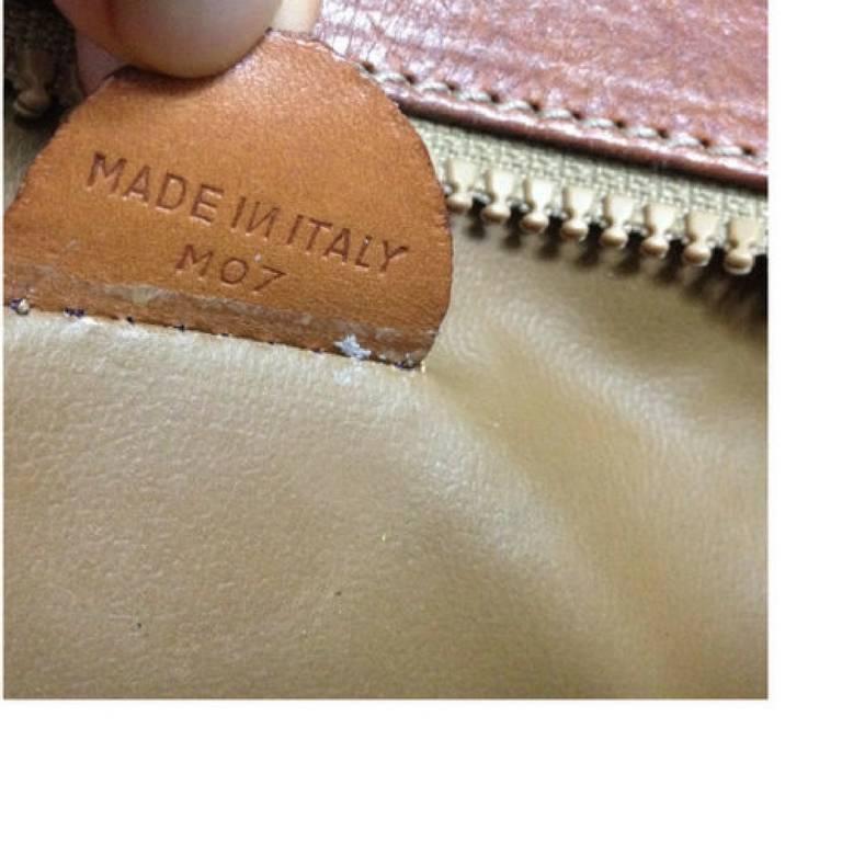 Women's or Men's Vintage CELINE brown macadam blason pattern cosmetic, toiletry purse. Clutch bag For Sale