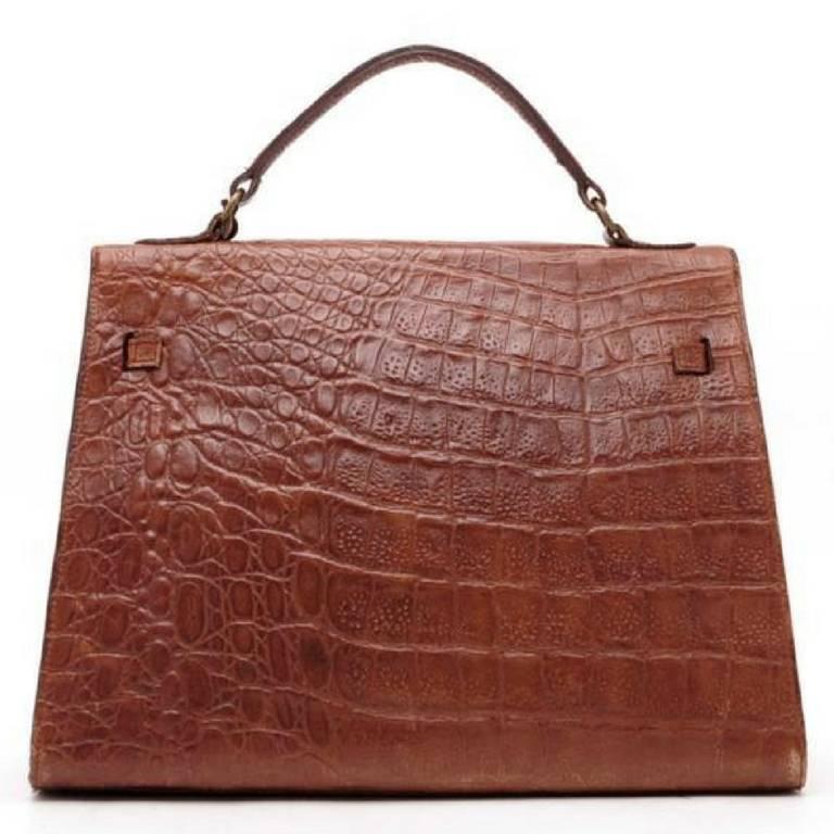 1990s. Vintage Mulberry croc embossed leather Kelly bag with shoulder strap. Roger Saul era. Rare masterpiece you must get.

Introducing another old sophisticated masterpiece from Mulberry in the Roger Saul era in the early 90's.
It has its deep