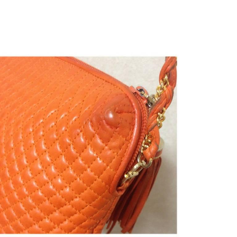 Women's Vintage BALLY orange quilted lamb golden chain shoulder purse with fringes. For Sale