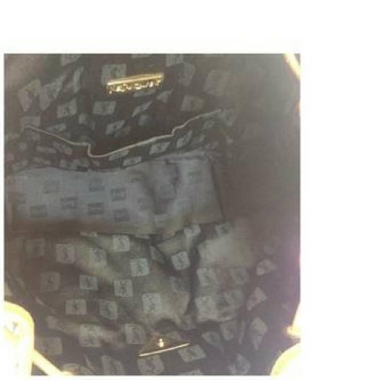 Women's or Men's Vintage Yves Saint Laurent  black hobo bucket shoulder bag with brown leather
