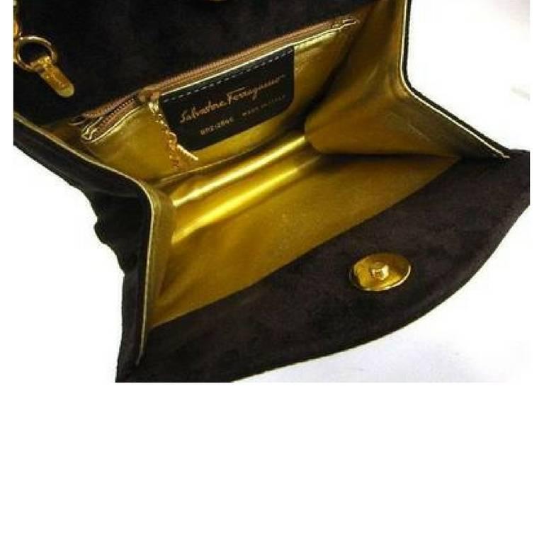 Vintage Salvatore Ferragamo dark brown suede shoulder bag, clutch, gold motifs. 1