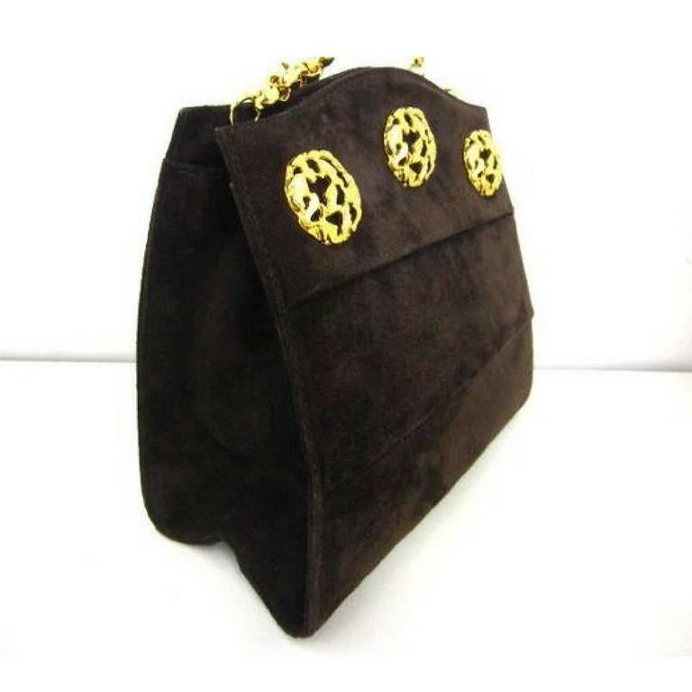 1990s. Vintage Salvatore Ferragamo dark brown suede leather party purse with golden decorative shoe motif charms and chain. Unique shape.

This is one from the Ferragamo's vintage beautiful pieces from early 90s.
What a cute and unique