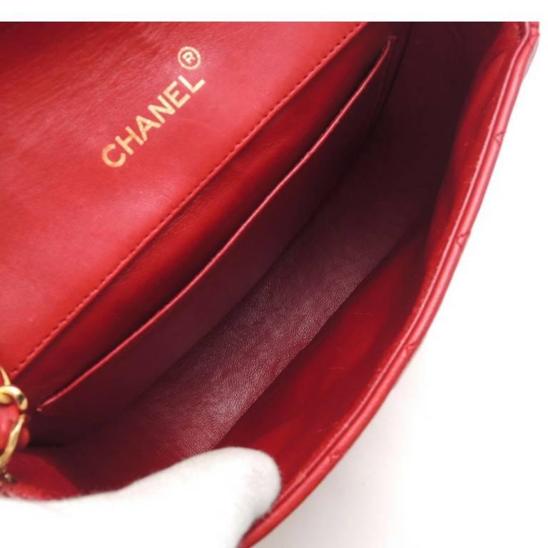 Vintage CHANEL red lambskin oval flap and shape 2.55 shoulder bag with large CC. For Sale 2
