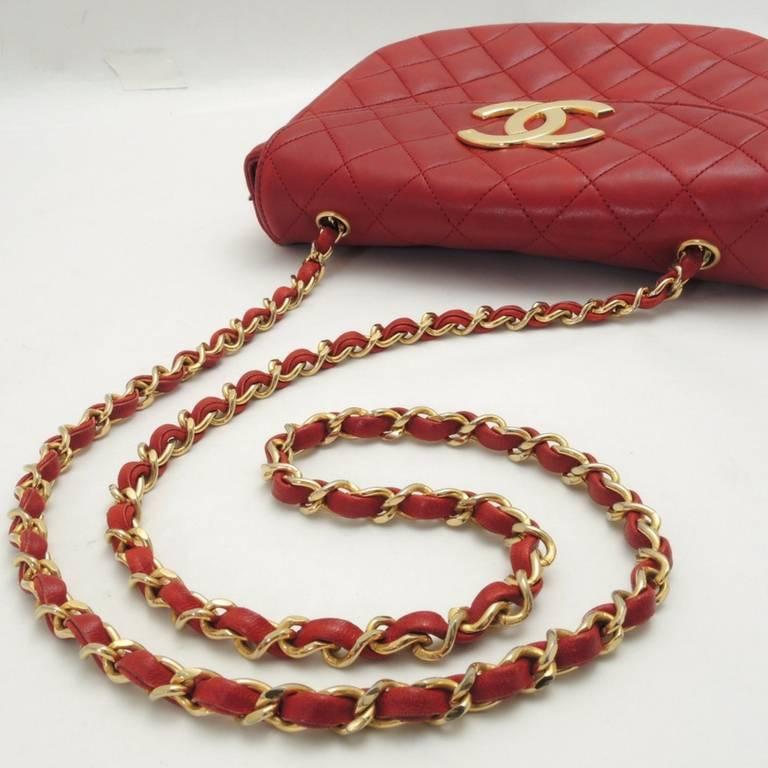 Vintage CHANEL red lambskin oval flap and shape 2.55 shoulder bag with large CC. For Sale 1