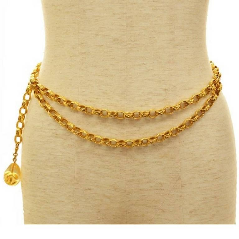 1990s. MINT.Vintage CHANEL double strand golden chain belt with crystal rock stone motif plastic CC charm. Perfect CHANEL accessory.

MINT condition! Fun and Chic and Gorgeous you!  Great gift idea. Free gift wrapping. 
A rare and unique design!