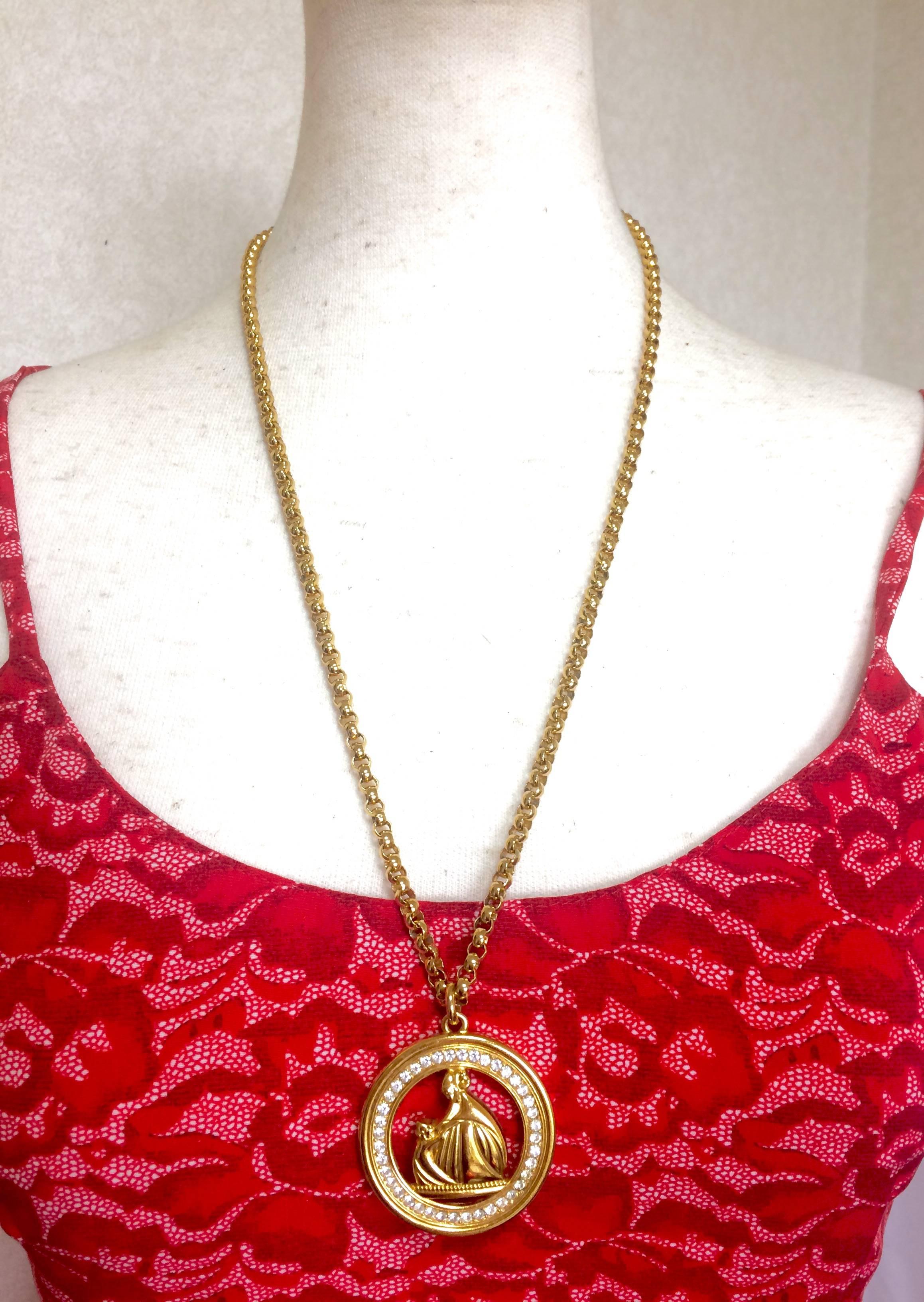 1990s. MINT. Vintage LANVIN golden chain necklace with large round logo pendant top with crystal stones. Perfect vintage jewelry. Germany made. 

MINT condition! Beautiful jewelry piece from LANVIN. Great gift idea. Free gift wrapping. 

Introducing