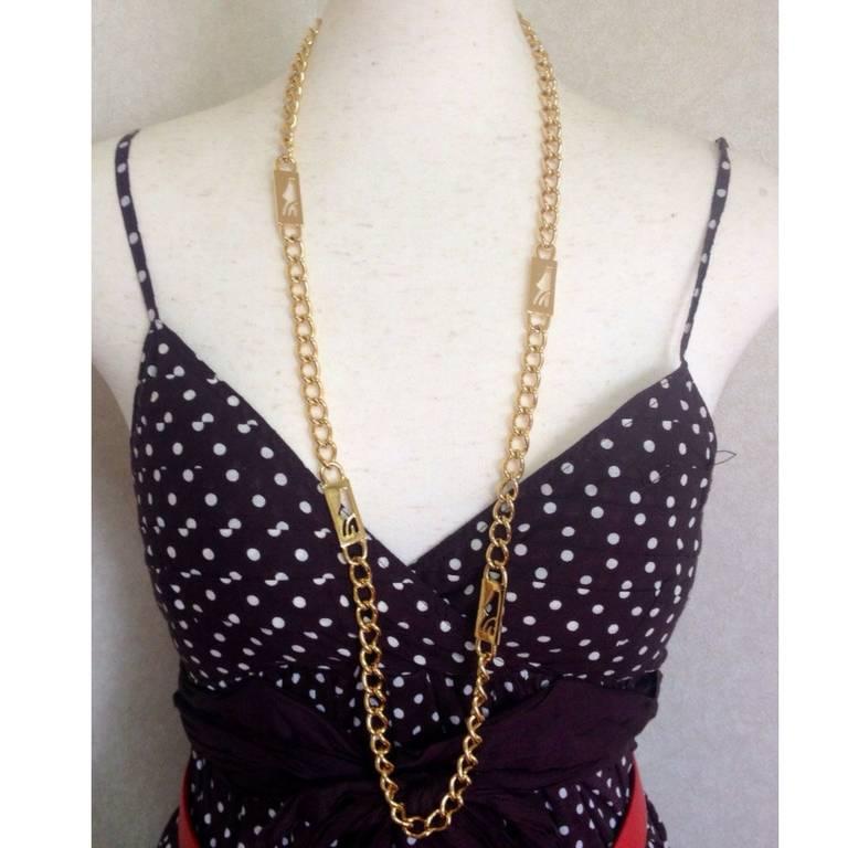 1990s. MINT. Vintage Salvatore Ferragamo chain necklace with golden shoe charm. Can be worn as belt.

MINT/Excellent vintage condition.


Here is another fabulous piece from Salvatore Ferragamo back in the era.
You can enjoy as necklace in single