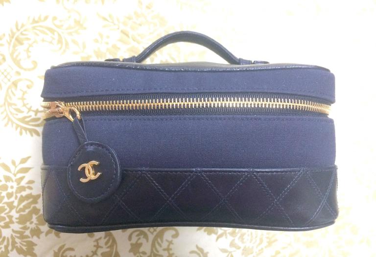 Vintage CHANEL black leather and canvas fabric vanity bag, cosmetic pouch.  For Sale at 1stDibs