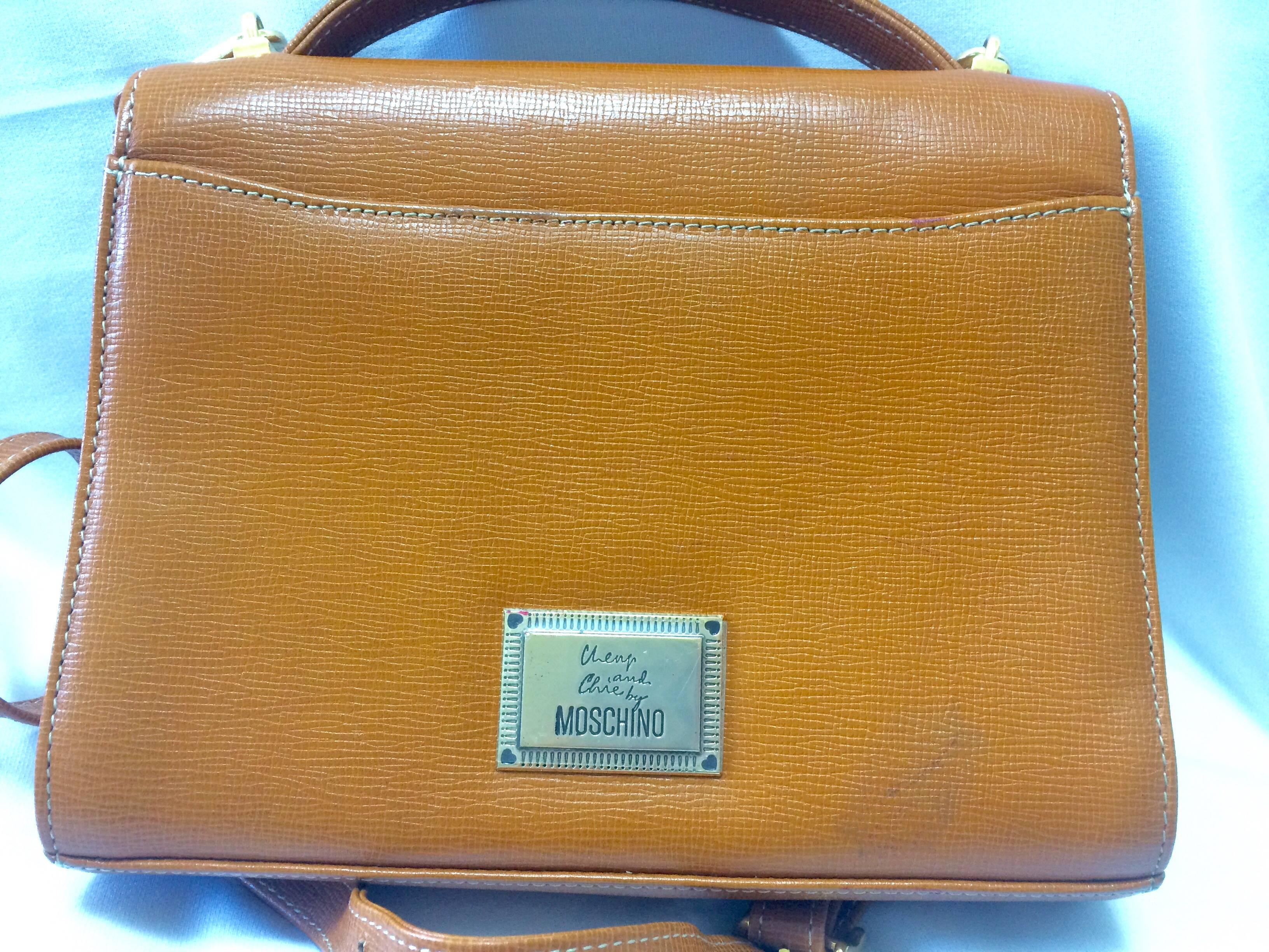 Orange Vintage MOSCHINO orange brown grained leather kelly shoulder bag with heart moti For Sale