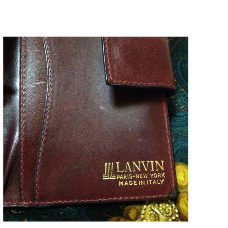 Vintage LANVIN wine logo jacquard and leather wallet with kiss lock coin room.  2