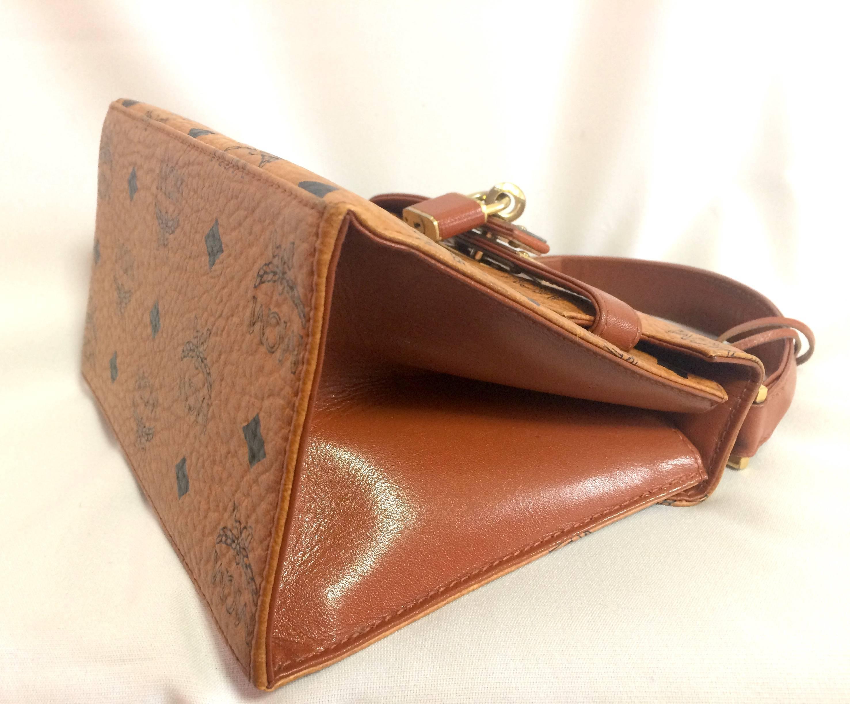 Women's Vintage MCM classic brown mini kelly bag with key, designed by Michael Cromer.