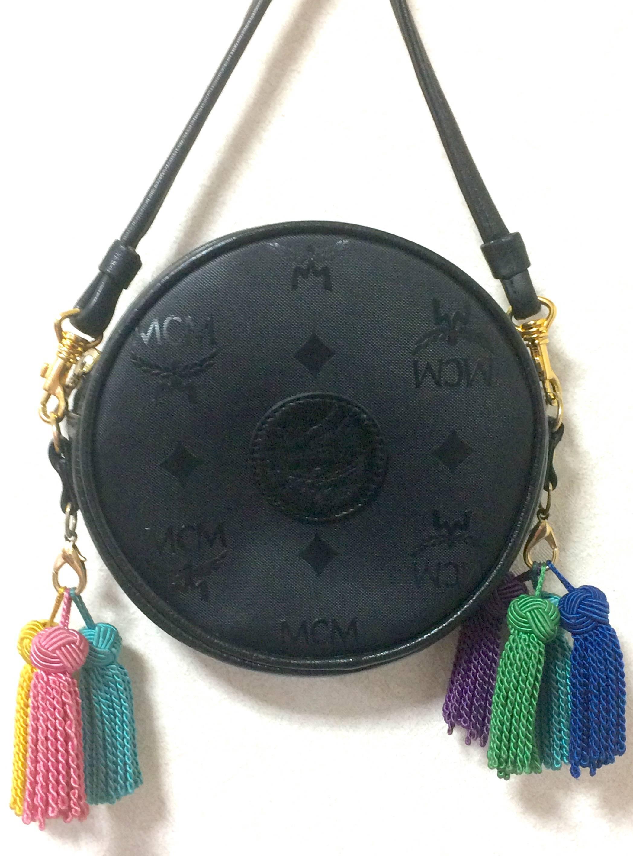 1980s. Vintage MCM black monogram Suzy Wong mini shoulder purse with multicolor fringes, designed by Michael Cromer. Made in West Germany.

Rare masterpiece you must have!

MCM has been back in the fashion trend again!!
Now it's considered to be one
