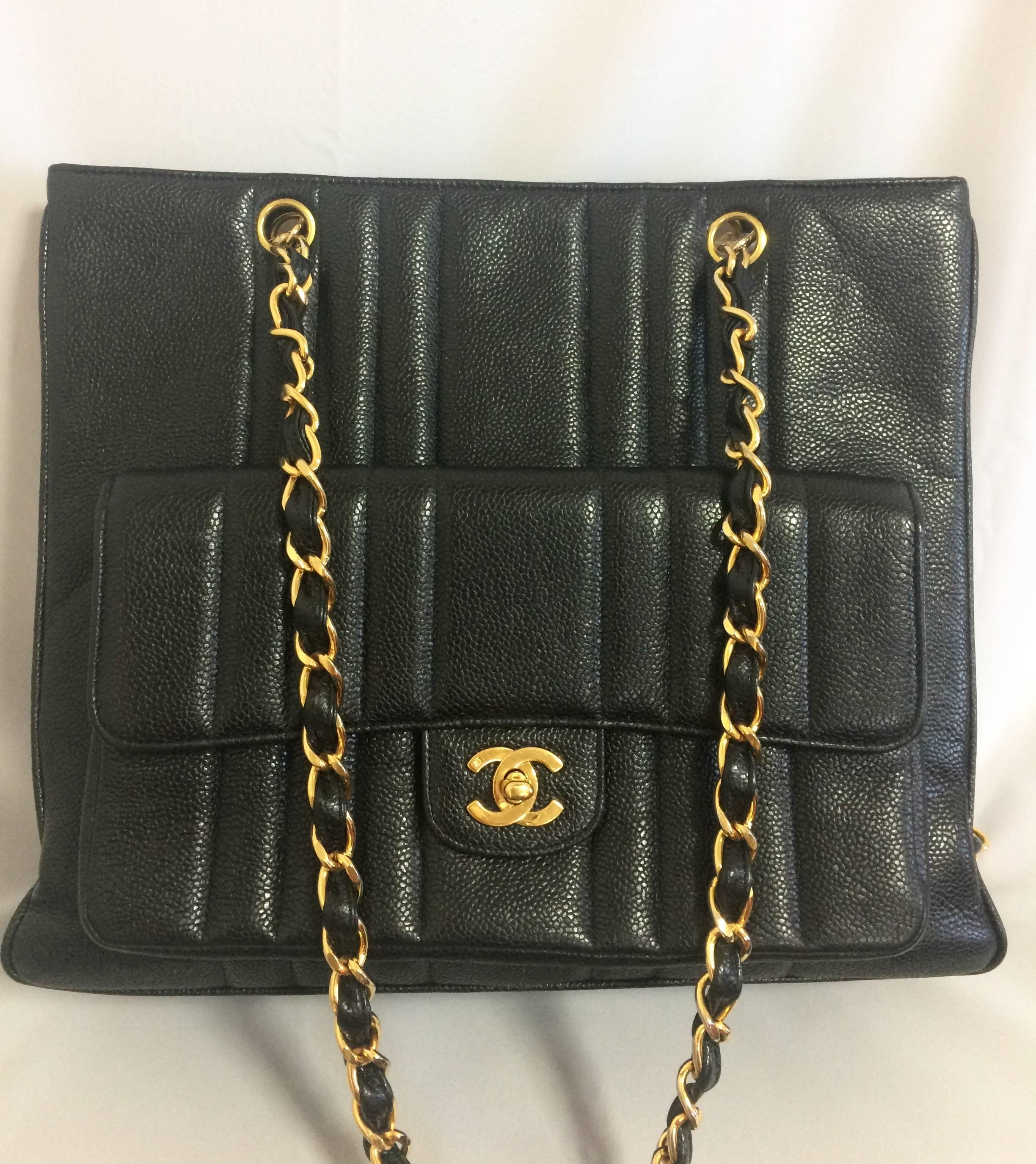 1990s. Vintage CHANEL rare 2.55 combo design black caviar leather chain shoulder bag with vertical stiches and golden CC closure hock at front pocket.

Beautiful vintage condition!
Introducing another unique vintage Chanel bag back in the approx mid