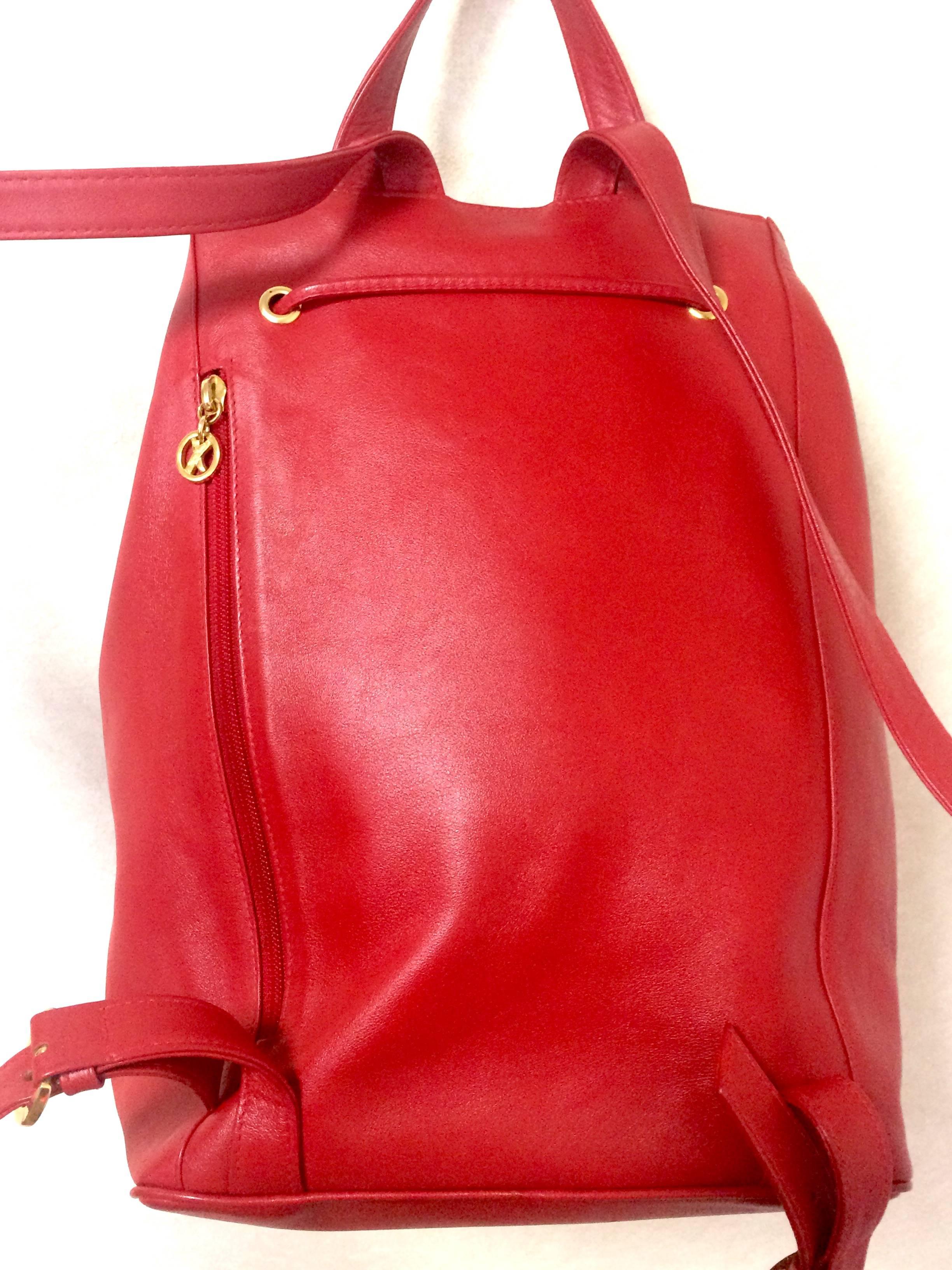 Vintage Paloma Picasso red leather backpack with golden logo motifs. Classic bag 1