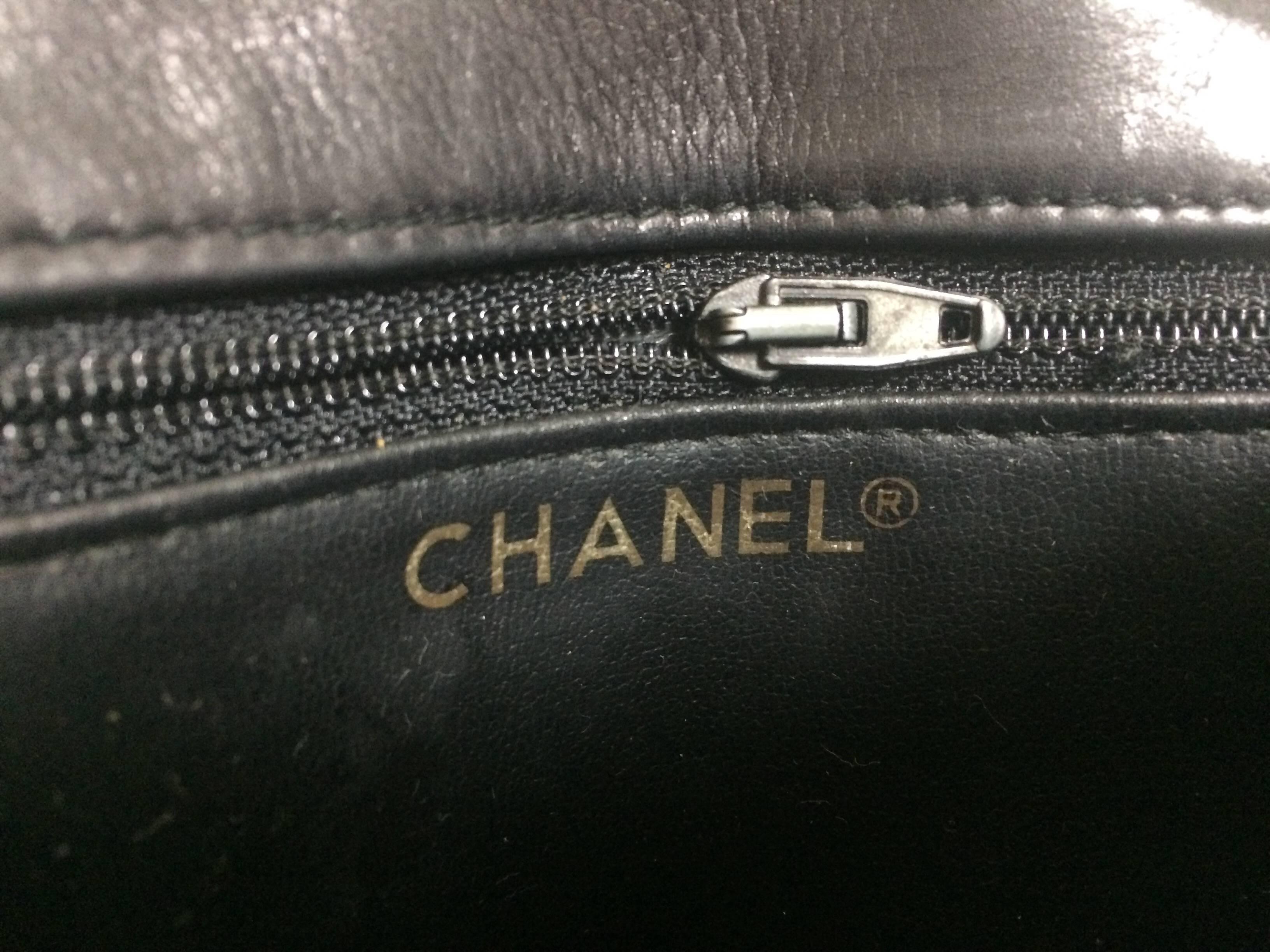 Vintage CHANEL black lamb waist bag, fanny pack with gold chain belt & CC motif. 3