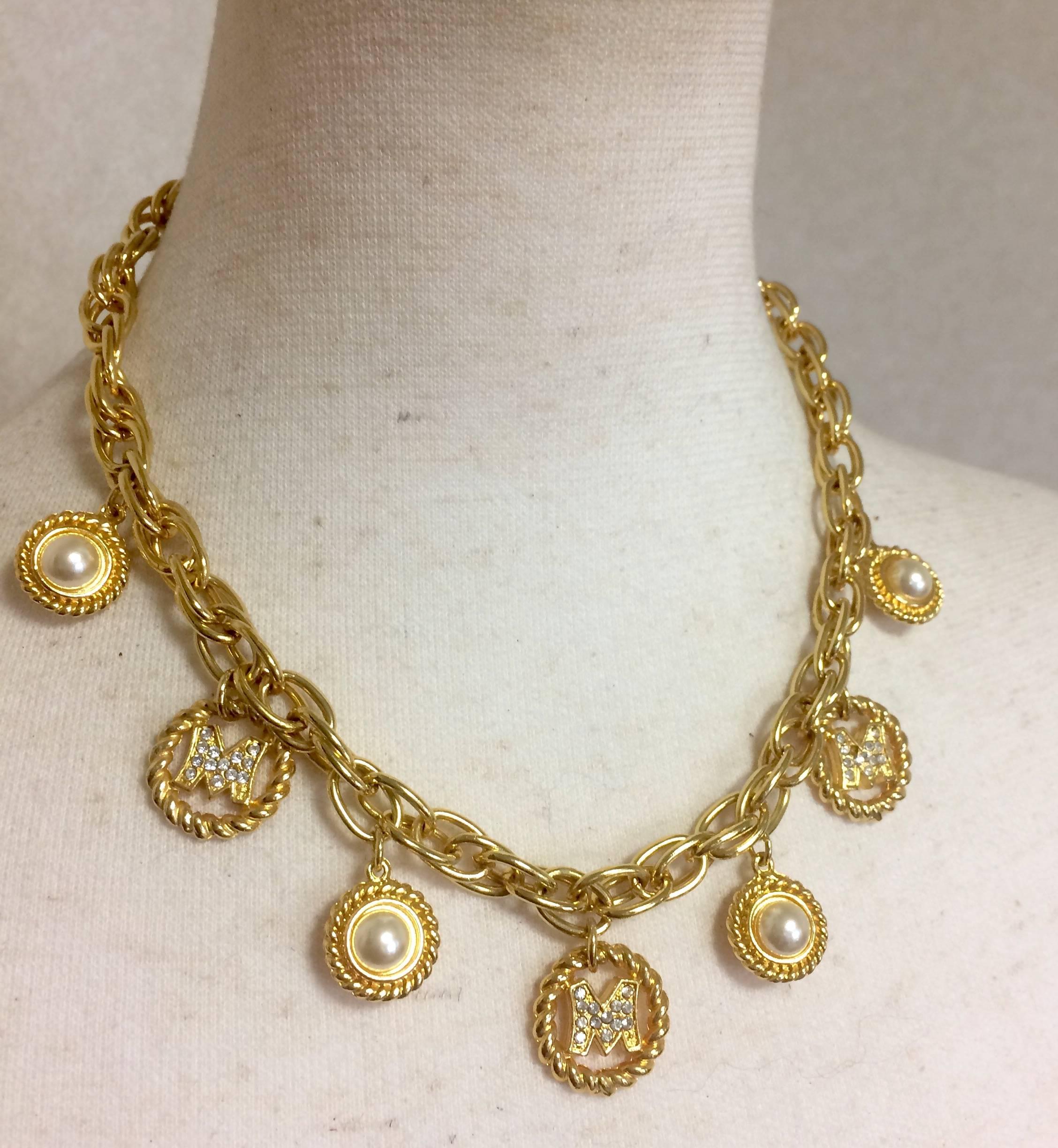 Vintage Moschino statement necklace with golden dangling charms with faux pearls For Sale 3